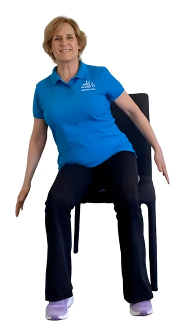 Move it or Lose it instructor demonstrating the rocking for core strength wobble cushion exercise on a chair